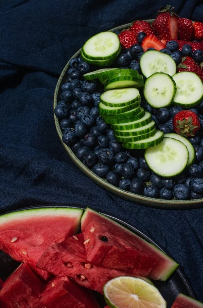 two-plates-on-a-linen-tablecloth-with-summer-fruit